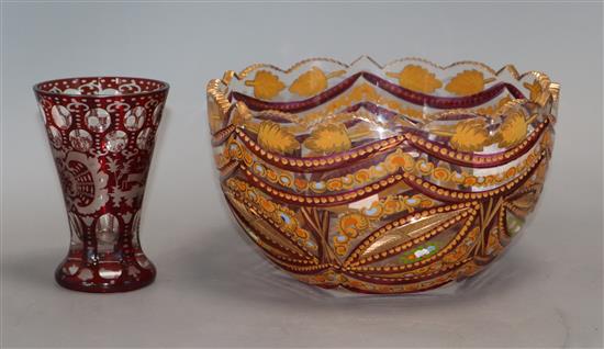 A Bohemian ruby flash toasting glass and an enamelled glass bowl